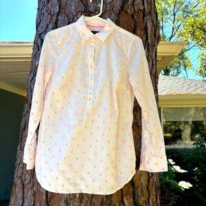 Light weight cotton top with embroidered neon pink dots.